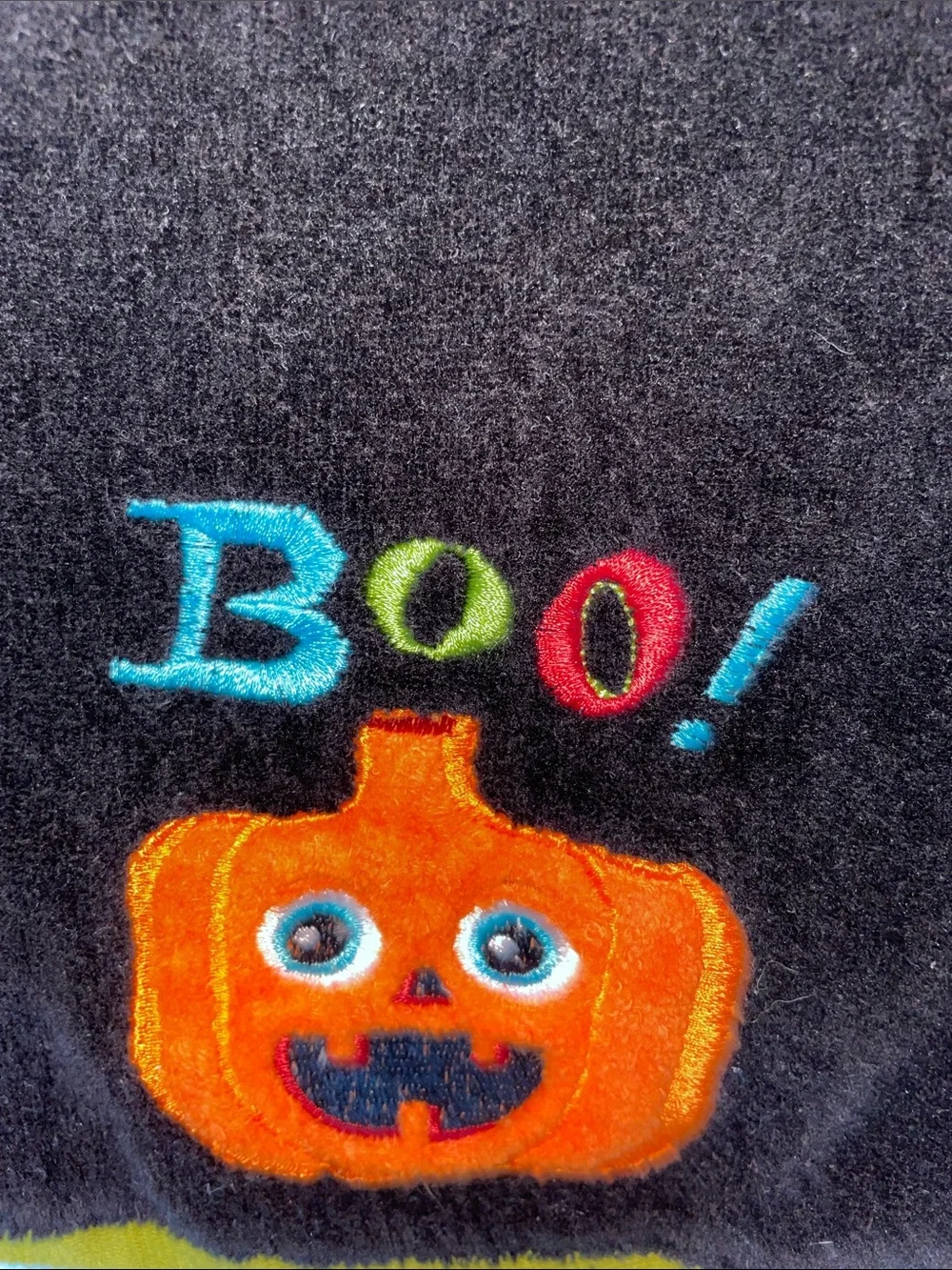 Two plush black Halloween towels - one hand towel & one fingertip